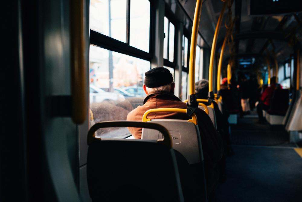 interior-city-bus-with-yellow-holding-rails.jpg
